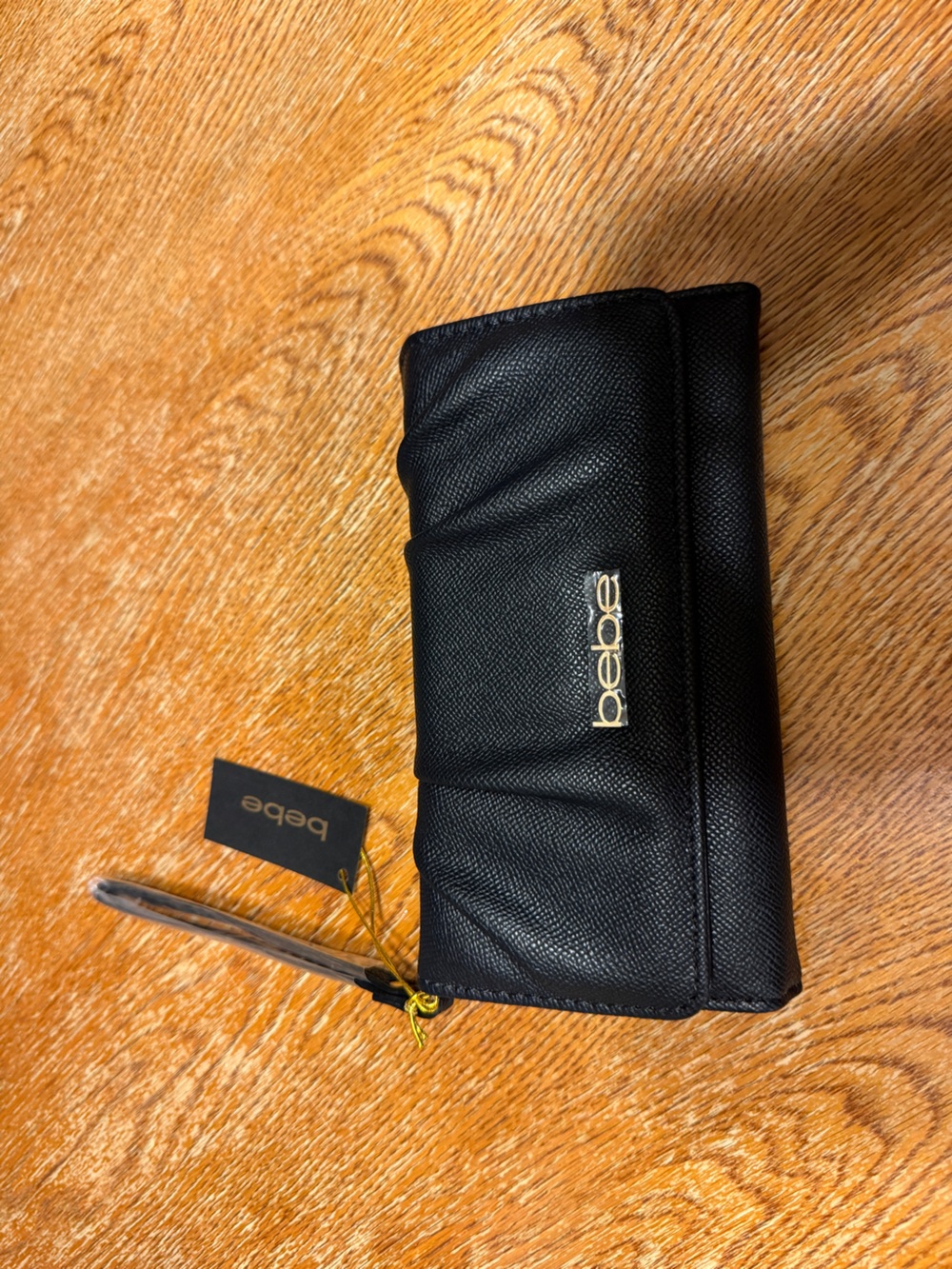 bebe Black Quilted Fold-Over Wallet with Gold Logo Accent